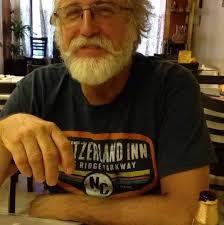 After reading a lot about airbrush primer I decided to prime with a  cellulose dark grey now trying to apply orange top coat Applied 3 coats of  orange and it still appears