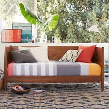 The daybed is mainly filled with sponge. Mid Century Daybed