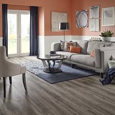 Add Warmth And Character To Your Living Room With A Wood Look Laminate Floor Shop This Rustic Trend Now Pergo Flooring Home Living Room Flooring