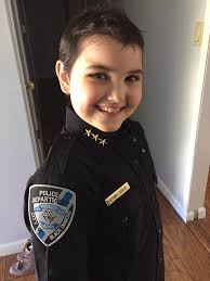 Members of the Clifton Forge Police Department are sporting new uniforms,  effective today. Here are, from left to right, officer Chris Black,  Investigator Travis Ledford, Chief Barry Balser and Sgt. Larry Hipes. (