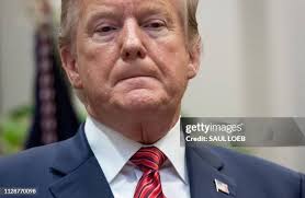 Frank Larkin, a retired Navy Seal, speaks during a signing ceremony... News  Photo