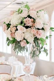 Some sample designs of floral arrangements we have supplied for wedding receptions. 39 Gorgeous Tall Wedding Centerpieces Wedding Forward Flower Centerpieces Wedding Pink Wedding Centerpieces Wedding Floral Centerpieces