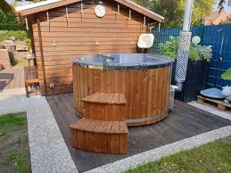 Badefass Gfk Mit Whirlpool Holz Befeuert Fur Draussen Kaufen In 2020 Badefass Sonnenschutz Garten Baden