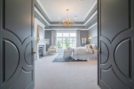 Double doors are used as a main door which gives a wide opening and space to the entrance and there are variations like swing doors, wooden patio doors, french style double door designs and. Gray Double Bedroom Doors With Paneling Transitional Bedroom