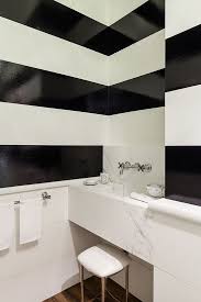Black And White Striped Wall Polished Palette The Powder Room Powder Room White Bathroom Black And White Decor