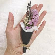 I agree that buttercream cupcake flowers on its own look beautiful but with a little accent of leaves here and there it looks even more realistic. Mini Dried Flower Bouquet Hobbies Toys Stationery Craft Occasions Party Supplies On Carousell