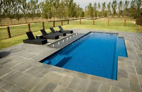 This Pool Offers Something Special For All Ages With An Unobstructed Swimming Corridor To Enjoy Fitness And Fu Fiberglass Swimming Pools Fiberglass Pools Pool