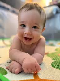 Hi guys! Can you please change the background to make it look like my son  is playing piano somewhere amazing?