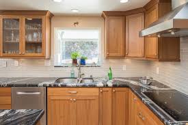 John Deluca Designed This Kitchen In Ramona California With Starmark Cabinetry S Bridgeport Door Style In Cherr Distressed Cabinets Custom Kitchens Cabinetry