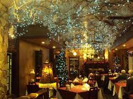 The Madison Inn Restaurant Dining Room With Christmas Decorations Decorating With Christmas Lights Commercial Holiday Decor Christmas Interiors