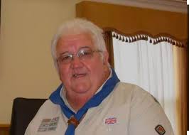 Chris Reed MBE. Represented the Scarlets. Served as a school governor, CAB  volunteer and Deputy Town Mayor. Gave 50 years of service to Llanelli  Scouts. Loud, larger than life and a good