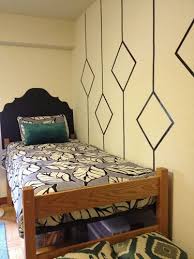 10 Dorm Room Decorating Ideas To Steal Cool Dorm Rooms Dorm Room Wall Decor Dorm Diy
