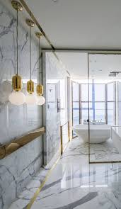 18 Gorgeous Marble Bathrooms With Brass Gold Fixtures Marble Bathroom Designs Bathroom Design Luxury Modern Marble Bathroom