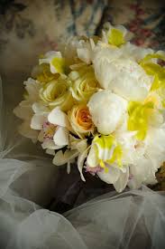 Intersectional and yellow itoh peony bushes. Lovely White And Yellow Bridal Bouquet Made Of Yellow Roses White Peonies And Orchids Yellow Wedding Flowers Flower Bouquet Wedding Wedding Flowers