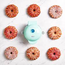 Simply dust with powdered sugar, pipe a bit of glaze over the top, or completely dunk the cakes for a heavier coating. Dash Mini Bundt Cake Maker