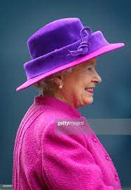 Queen Elizabeth Ll Wearing A Mauve Straw Hat Decorated With Violets Queen Elizabeth Ii Fashion Elizabeth Ii Queen Elizabeth