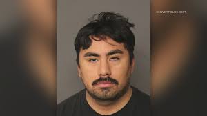 Denver Police officer arrested in 2 separate cases