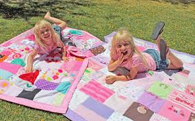 Baby Clothes Quilts Memory Quilts Jelly Bean Quilts Our simple baby clothes quilts are made using a block or two from each clothing item. baby clothes quilts memory quilts