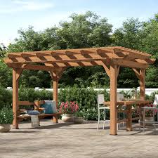 We installed pavers on the concrete slab and ledge stone to the beams. How To Build A Modern Pergola
