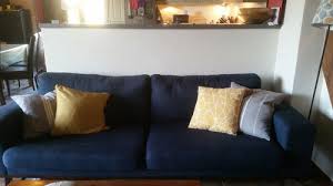 Freshen up the look of your room, without committing to a redesign, by simply switching the decorative pillows. Photo Ledge On Half Wall Behind Couch