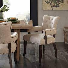 The standard armless design fits well with any style of dining room table. Idabel Tufted Upholstered Arm Chair In Oatmeal Farmhouse Dining Chairs Dining Arm Chair Dining Chairs