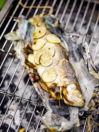 barbecued trout in newspaper fish