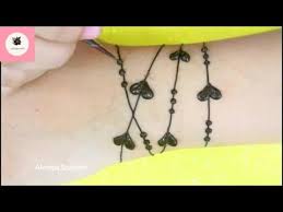 New Dots And Hearts Bracelet Mehndi Design 2019 Easy Simple Mehndi Design Back Hand Henna Henna Tattoo Designs Simple Mehndi Designs Simple Mehndi Designs