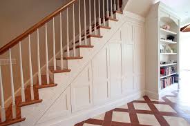 Rolling cabinet shelves under the staircase. Creating Storage Underneath Your Stairs Fine Line Homes