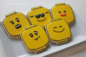 Items Similar To One Dozen Lego Head Cookies On Etsy Lego Cookies Cookie Decorating Pretty Cookies