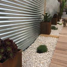 Corrugated Board Fences A Full Review And Inspirational Examples Interiorsherpa Corrugated Metal Fence Metal Garden Fencing Backyard Fences