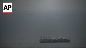 Iran state TV video claims to show navy seizing vessels in Strait of Hormuz