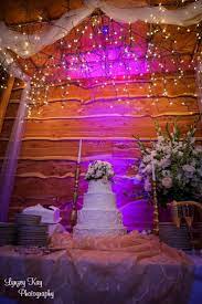 Outdoor Rustic Barn Wedding Venue East Texas Willow Creek Ranch Bride S Cake With Flower Top East Texas Wedding Venues Barn Wedding Venue Wedding Venues Texas