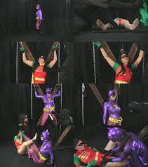 Batgirl and Robin-girl hypnoitzed - Fetish-Island.com : New Fetish Movies