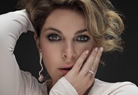 Claudia gerini at the photocall of non ti muovere during the 57th international cannes film festival. Claudia Gerini