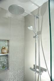 This hand held shower head is part of a casual and comfortable shower surrounded by different sized tile. Bathroom Design Pictures Remodeling Decor And Ideas Page 53 Shower Heads Shower Fixtures Bathroom Inspiration