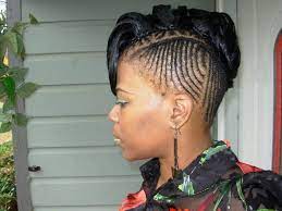 This stunning updo gives a whole new twist to afro hairstyles. Braided Faux Hawk Hair Styles Braided Hairstyles Braids For Black Hair