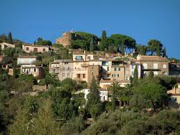 Bormes Les Mimosas Castle Dominating The Houses Of The Hilltop Village Pines Palm Trees And Cypress Trees France Voya France Travel France Provence France