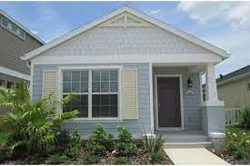 Spring Cottage Tradition By Neal Communities At Grand Palm Cottage House Plans Cottage Homes New Homes For Sale