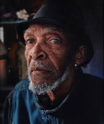 The first Dipped Painting and Drip Sheet that Oliver Jeffers ever completed  tells the story of his maternal grandmother. To form the portrait of the  sitter, Oliver spends time with the person