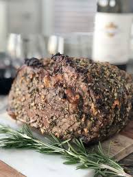 Tldr age it in the fridge for up to 4 days, cover exterior with rub, sear on stove, and roast 5 hours at 200°. Prime Rib With Rosemary Garlic Butter Rub