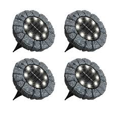 Get the best deals on solar stone outdoor lighting. Bell Howell Ultra Solar Powered Outdoor Integrated Led Path Landscape Disk Lights In Sto The Home Depot Canada