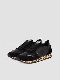Your shoes do a lot of work and are an opportunity to make a statement. Running Sneakers In Animal Print Monogram Faux Leather Trussardi