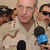 U.S. Secretary of Defense Richard Cheney and Chairman of the Joint Chiefs  of STAFF GEN. Colin Powell disembark a VC-137 Stratoliner transport  aircraft of the 89th Military Airlift Wing from Andrews Air