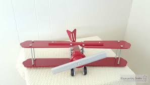 Red plane propeller airplane ceiling fan pull chain. How To Repurpose Ceiling Fan Blades Into An Airplane