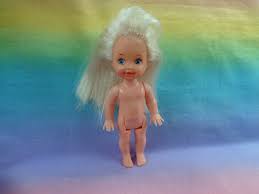 Her hair may have been cut, it is hard to tell because this doll has purple/silver hair coloring and i have not seen this color on a kelly doll before. 1994 Mattel Barbies Little Sister Kelly Doll And 10 Similar Items