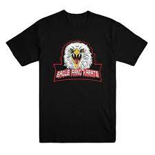 Design is placed on front of shirt. Eagle Fang Karate Adult Unisex Black Tee Cobra Kai Store