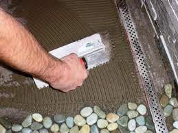 Video covers the installation of dixie red decorative stone on a xeriscape project. How To Lay A Pebble Tile Floor How Tos Diy