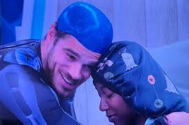 T'kor and Tucker hug it out. Tucker, “Keep your head high and stick with  your gut.” #bb26