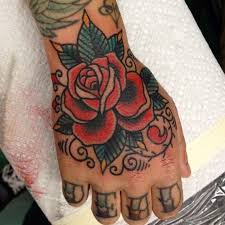 Maybe you would like to learn more about one of these? 101 Hand Tattoo Ideas For Men Incl Initials Pics Symbols And Dates Traditional Hand Tattoo Traditional Rose Tattoos Rose Hand Tattoo