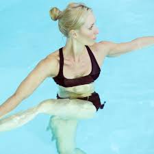 A swimming pool, swimming bath, wading pool, paddling pool, or simply pool is a structure designed to hold water to enable swimming or other leisure activities. I Tried A Water Yoga Class And Left Feeling Calmer Than Ever Water Yoga Pool Workout Become A Yoga Instructor